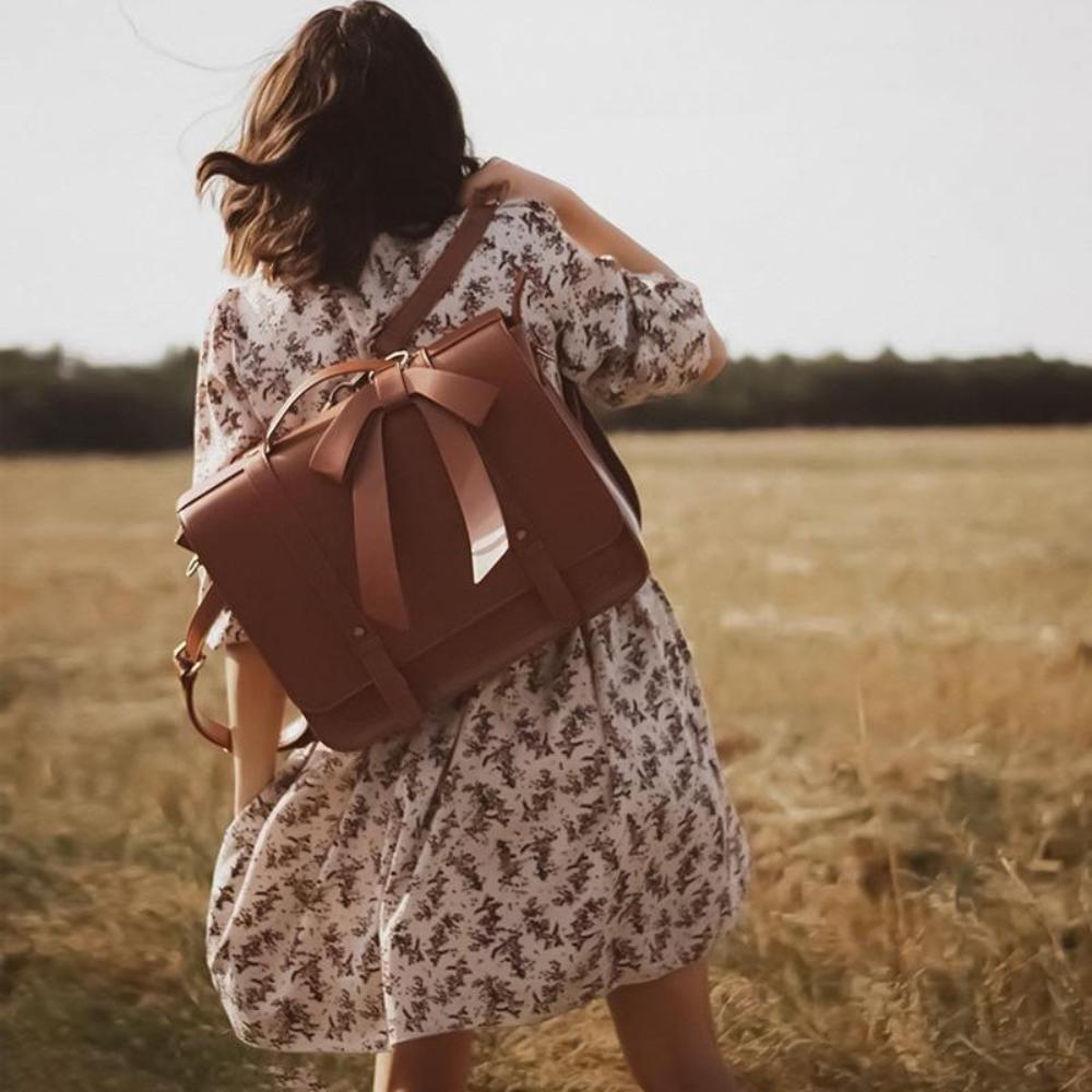 Giulia™ | La borsa a nodo dall’eleganza senza tempo